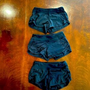 Size 10 girls black Ivivva speed ups